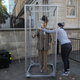 A protester arranges a figure resembling pro-Brexit politician Nigel Farage (former leader of the UK Independence Party) before the anti-Brexit demonstration in central London.